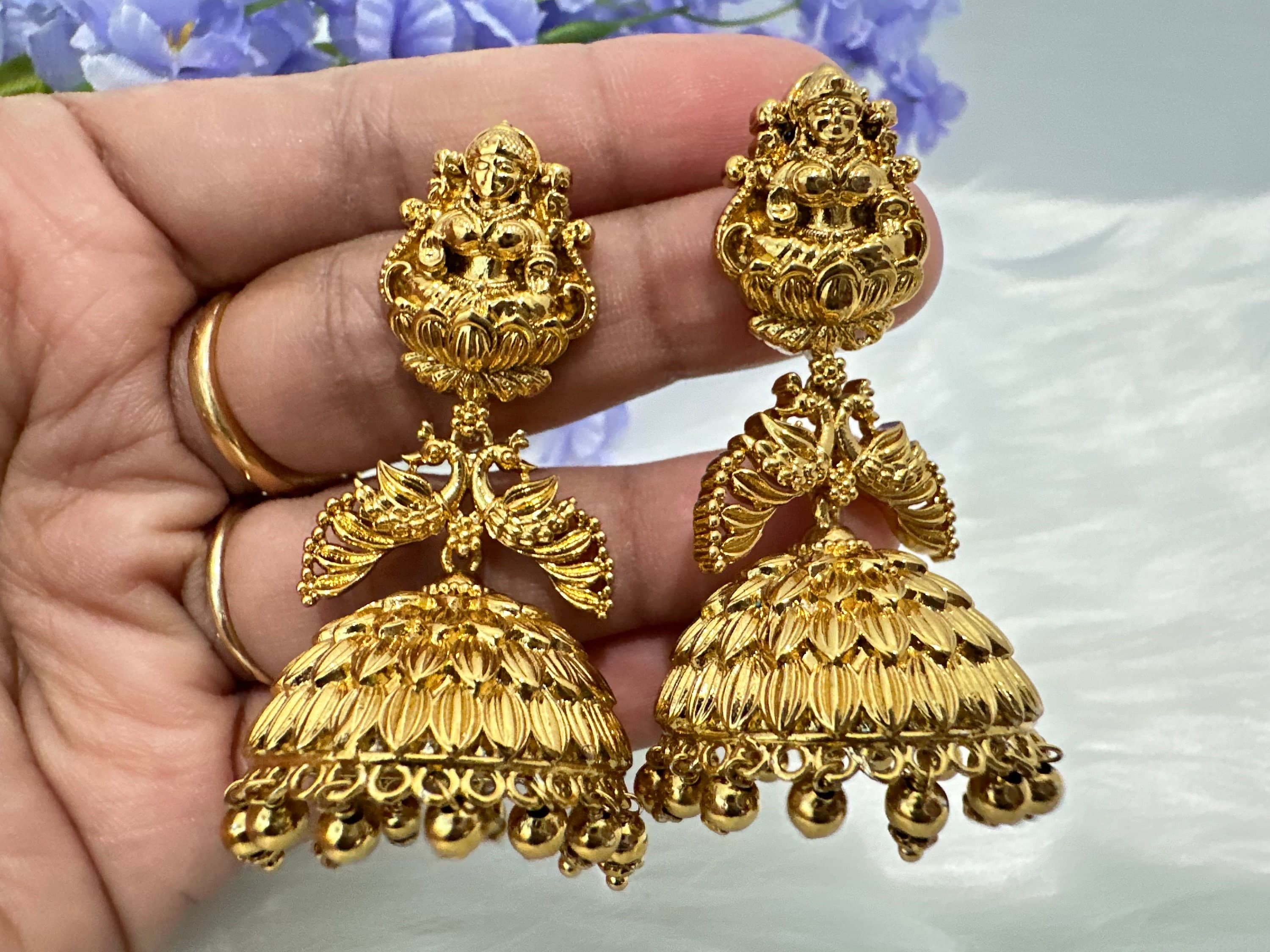 Matte gold finish laxmi design earrings