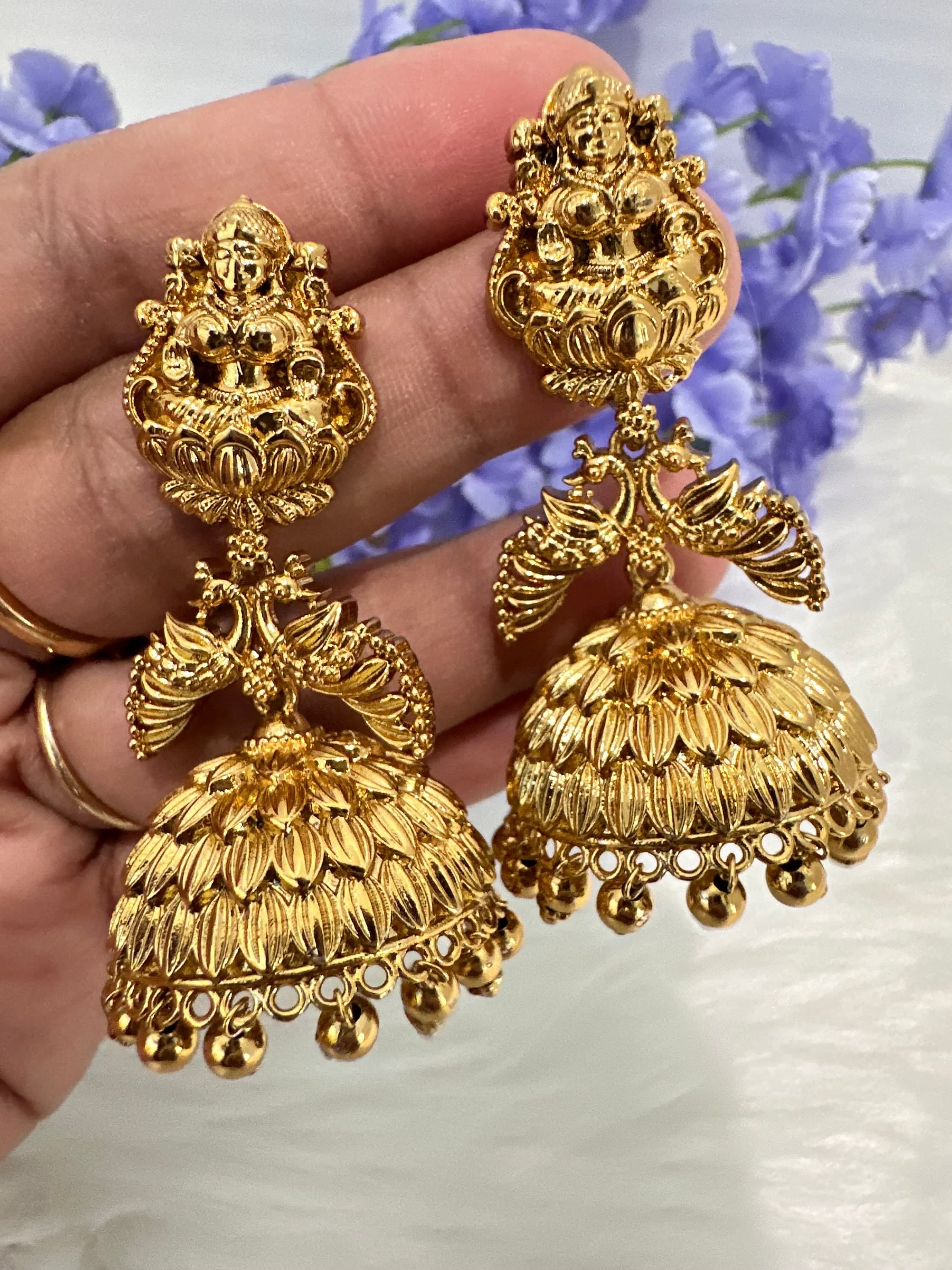 Matte gold finish laxmi design earrings